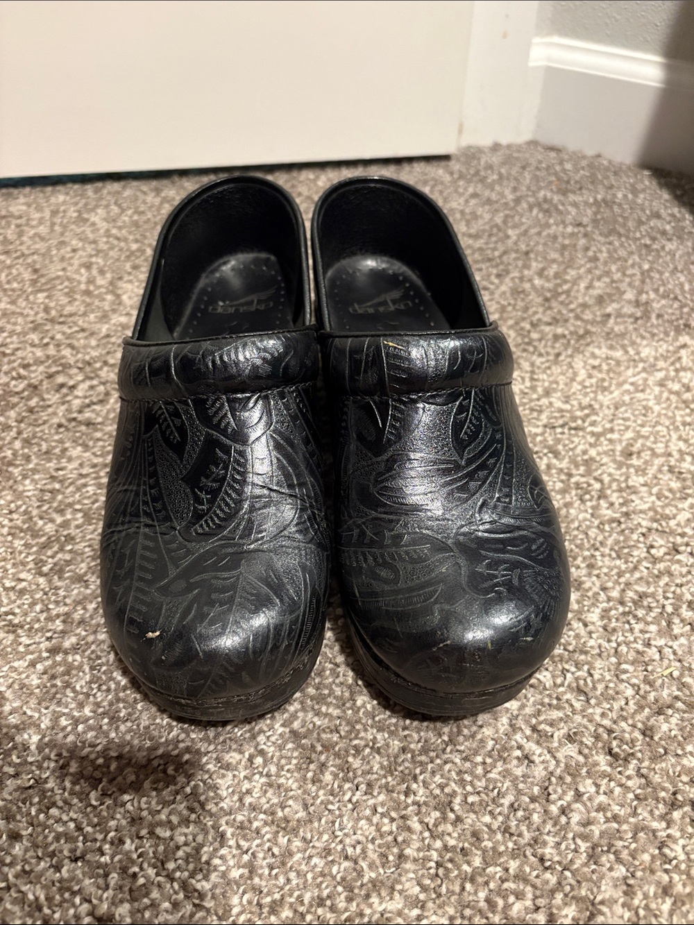 Dansko Black Embossed Leather Slip-On Clogs